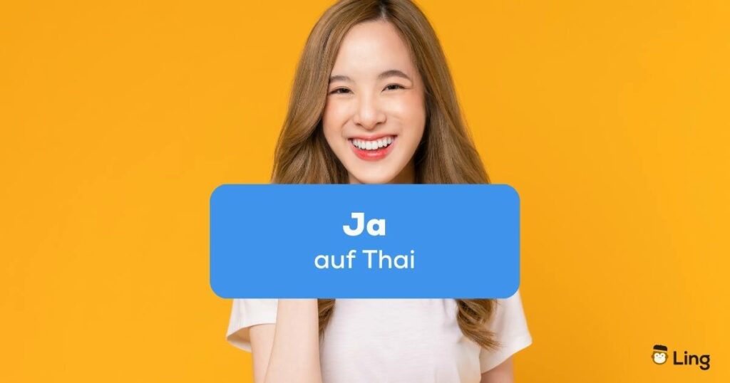 Thai Frau lächelt und freut sich und will ihre Zustimmung mit Ja auf Thai sagen