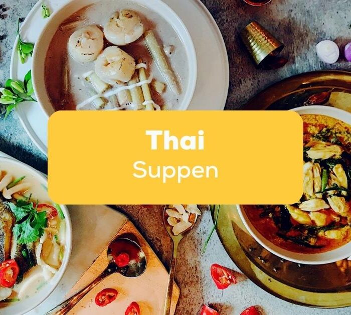 Tisch mit drei unterschiedlichen Thai Suppen