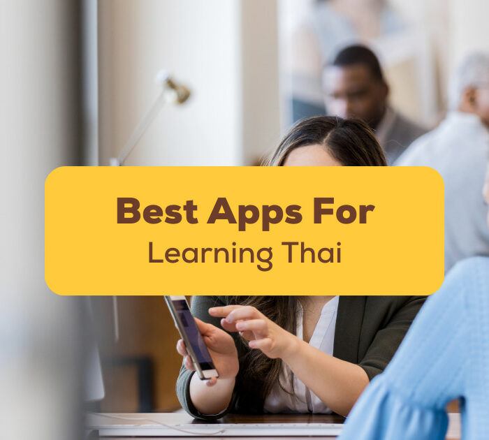 Best Apps For Learning Thai - A photo of a woman using her phone