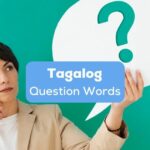 Tagalog question words - A photo of a woman holding a question mark