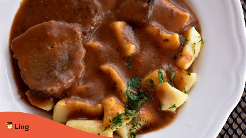 Popular Croatian Dish Pasticada Meat and potatoe in brown sauce