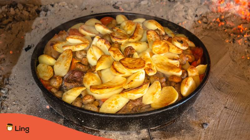 Pan with Croatian Must Try Meal Peka with potatoes