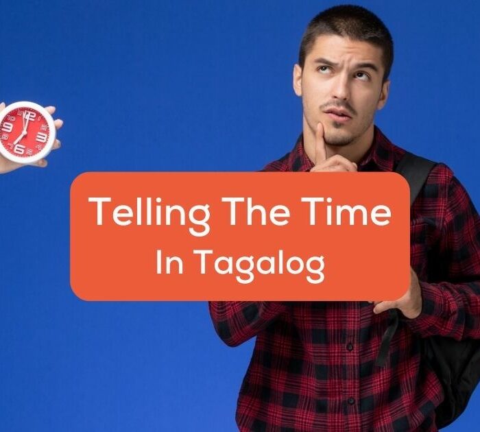 telling the time in Tagalog - A photo of a man with a clock beside him