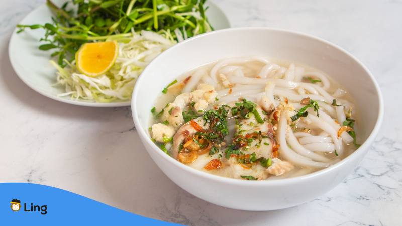 Bowl with Vietnamese thick noodle Soup Banh Canh