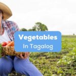 vegetables in Tagalog - A photo of a woman on a farm holding her newly harvested veggies
