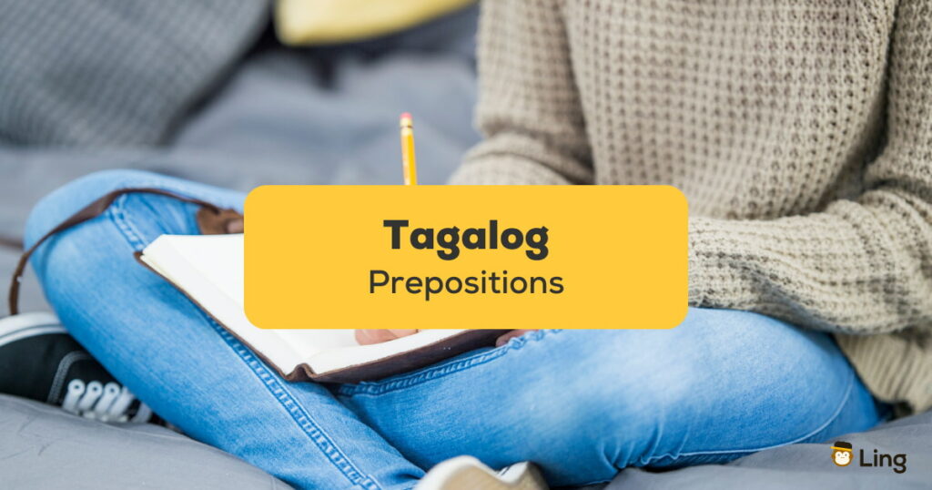 Tagalog Prepositions - A photo of a sitting person.