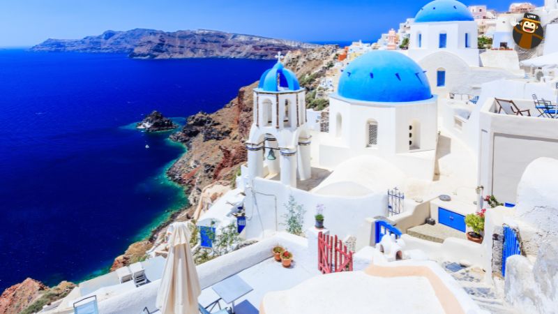Beautiful white and blue buildings on the coast of Greece 