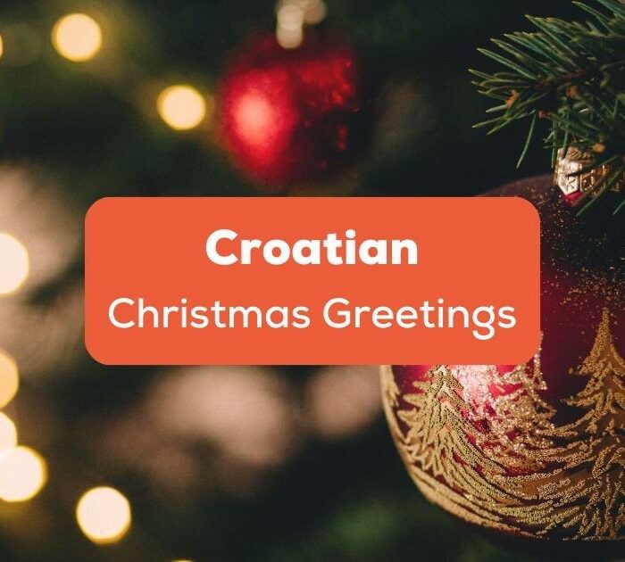red christmas baubles with glittering tree decorations and learn how to say croatian christmas greetings
