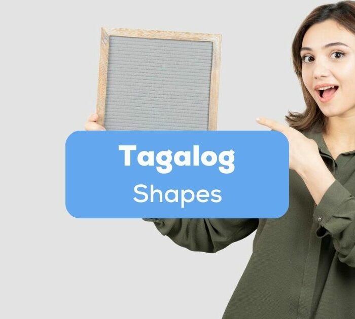 Tagalog shapes - A photo of a woman holding a square object.