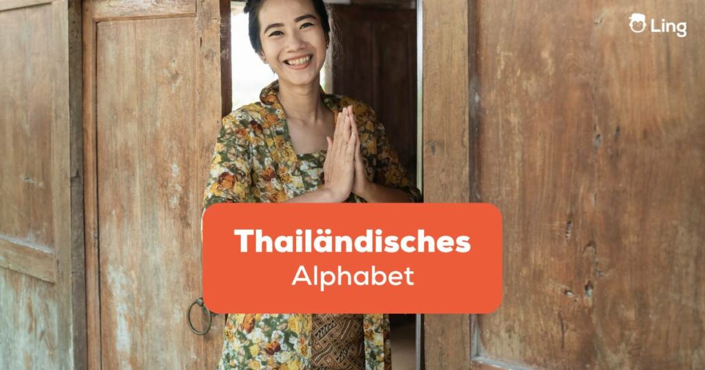 Thailändische Frau begrüßt mit einem Wai und sagt Willkommen auf Thai