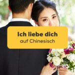 Chinesisches Brautpaat, das Ich liebe dich auf Chinesisch ausdrückt