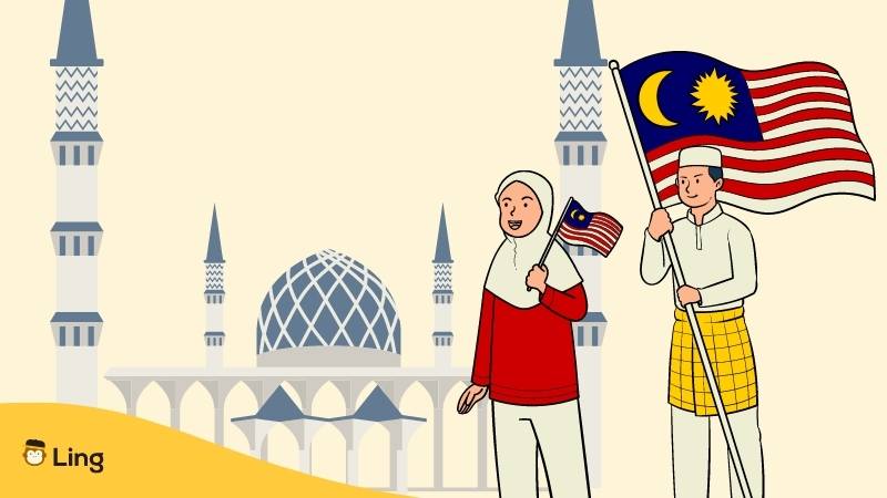 Muslimische Frau und Mann mit malaysischer Flagge stehen vor blauer Moschee in Malaysia
