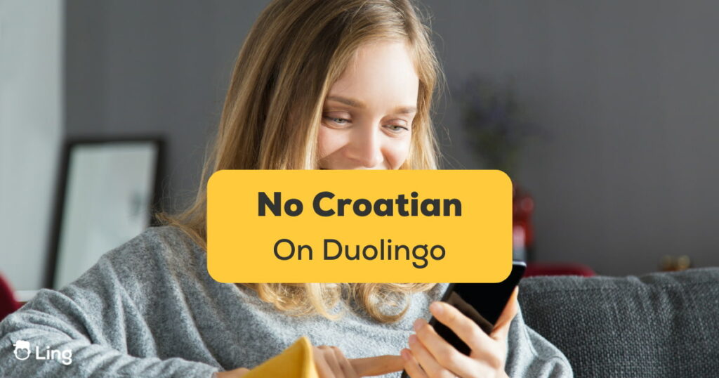 Woman looking on her phone and wondering why there is No Croatian On Duolingo