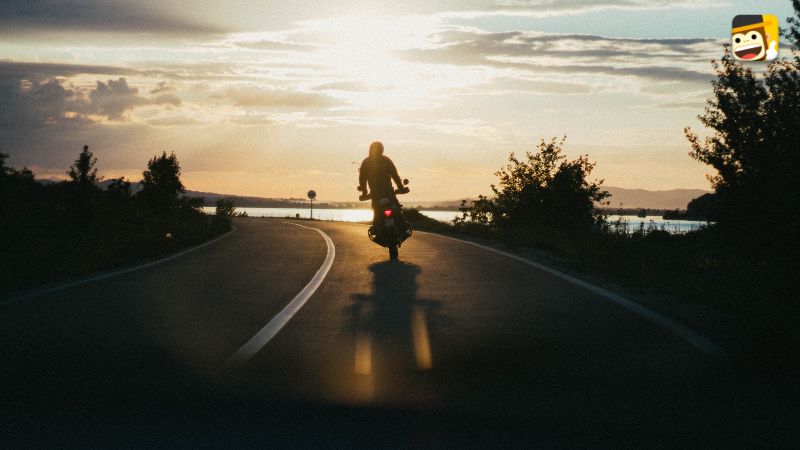 Riding motorcycle into the sunset transportation method portuguese