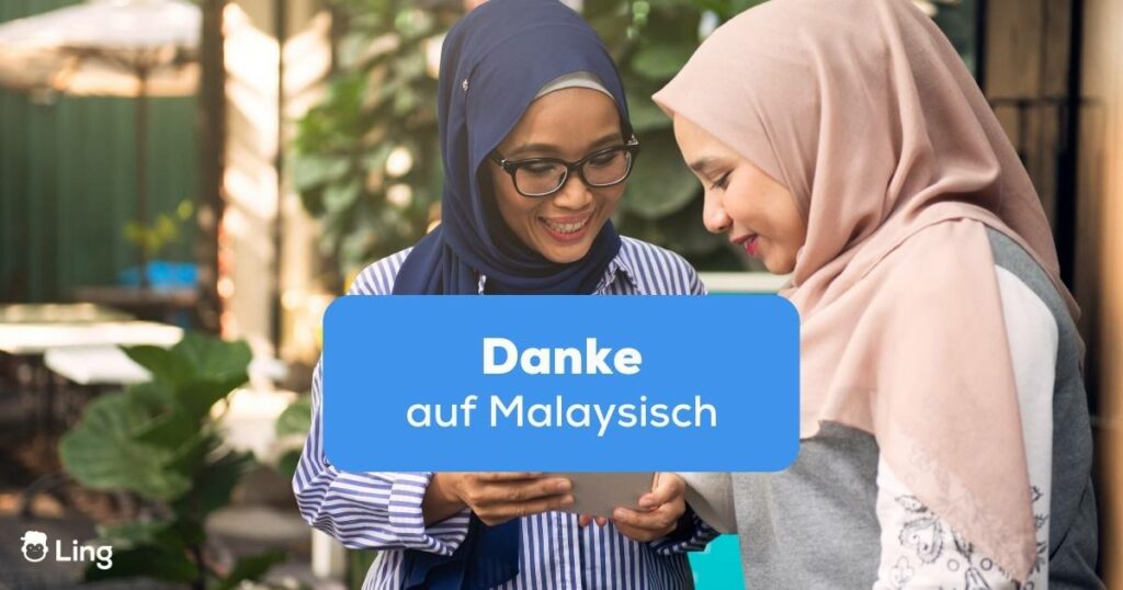 Zwei Freundinnen im Kopftuch unterhalten sich über Danke auf Malaysisch