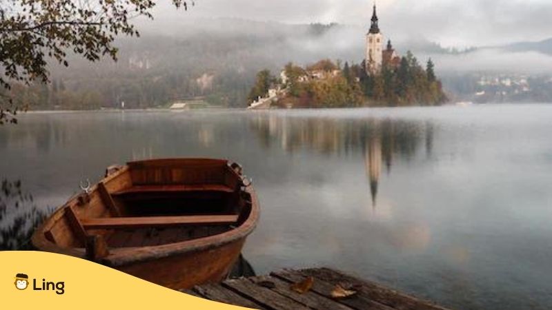 Bosnian Myths And Folktales. Rowing Boat on a Lake with a Fairytale Castle