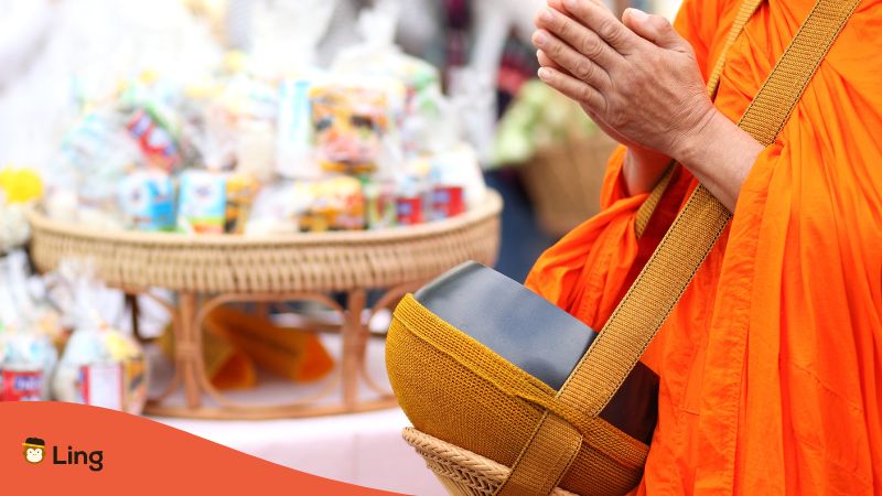Buddhist Monk Seeking Alms Depicts Religion In Laos A Buddhist Monk Seeking Alms