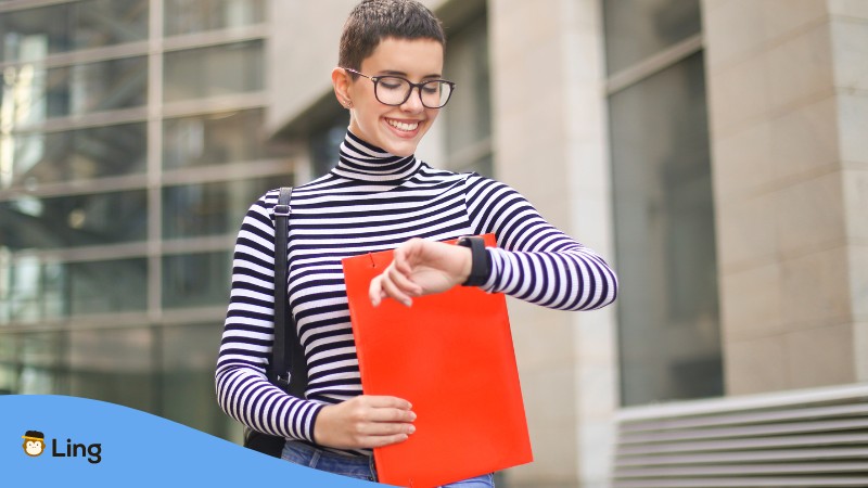 A woman on-time for her meeting in Malaysia.