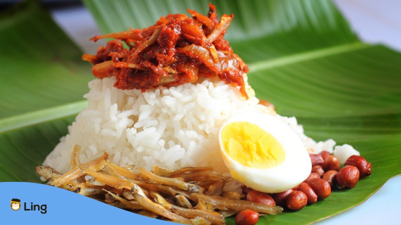 Nasi Lemak served in banana leaf.