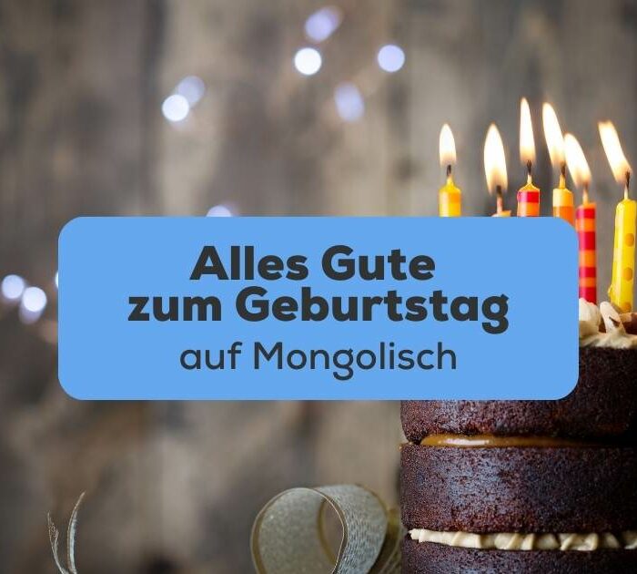 Geburtstagskuchen mit Kerzen um Alles Gute zum Geburtstag auf Mongolisch zu wünschen