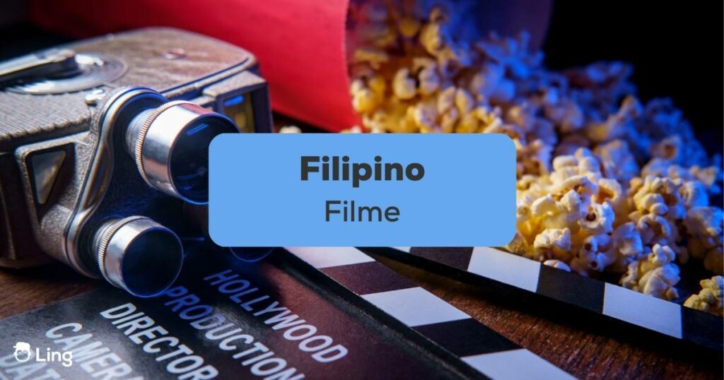 Popcorn und alte Kamera liegen verteilt auf dem Tisch Filipino Filme Ling App