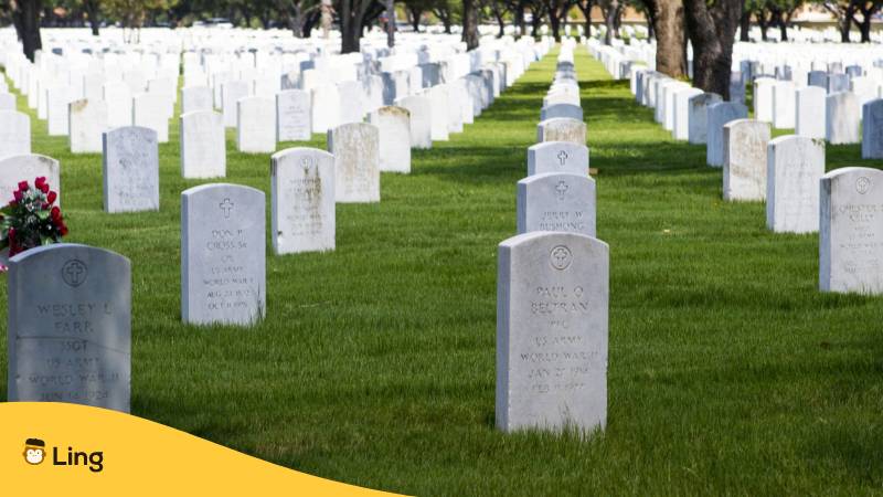 Tombstones in a cemetery showing japanese Proverbs about death