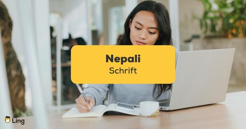 Nepali Schrift Asiatin schreibt in Notizbuch vor Notebook