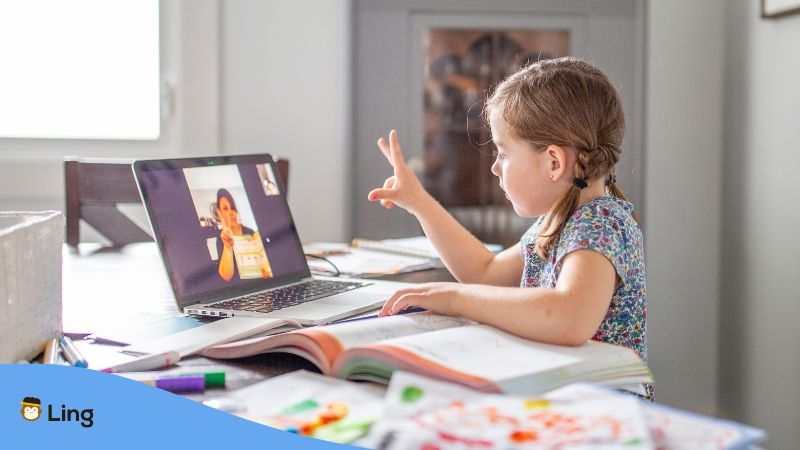 A kid learning the Malay language with her online tutor.