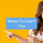 A girl showing ways to learn Thai language.