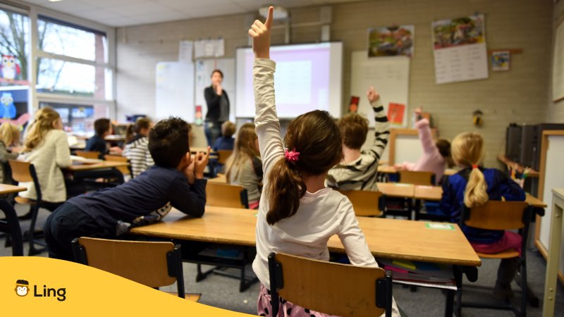 Bosnian school words, child raising her hand in the classroom