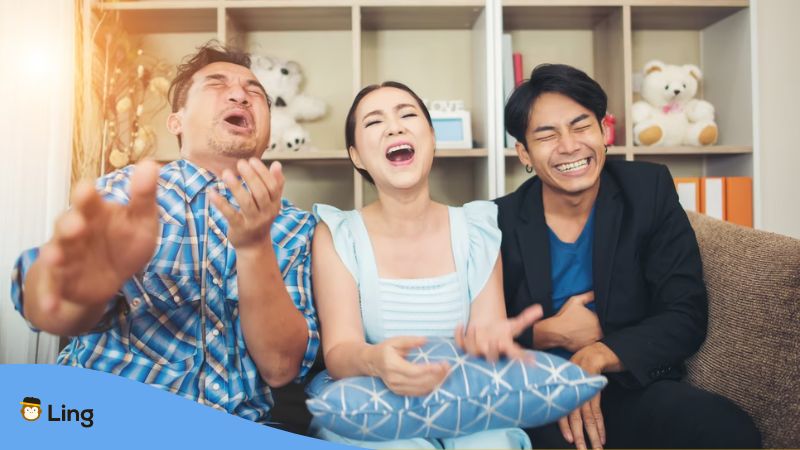 A photo of a family talking and laughing after watching a funny movie in a foreign language.