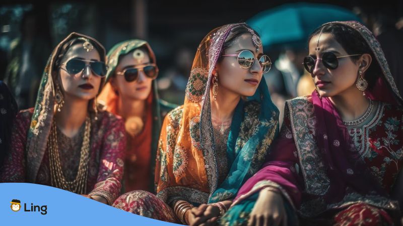 Beautiful Punjabi women in sunglasses wearing Parandas.
