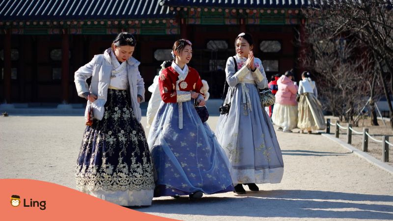 South Korean ladies wearing their traditional dress outside a temple.