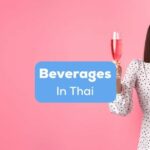 A photo of a Thai girl holding a glass with beverages in Thai.