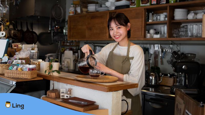 A female coffee shop owner pouring a freshly brewed coffee keeping alive the cafe culture in South Korea.