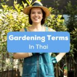 A happy, pretty female gardener in her garden behind the gardening terms in Thai texts.