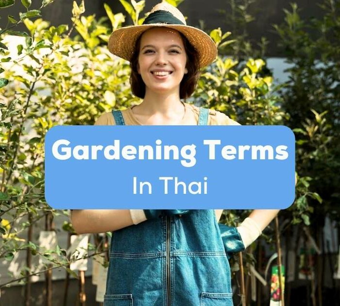 A happy, pretty female gardener in her garden behind the gardening terms in Thai texts.