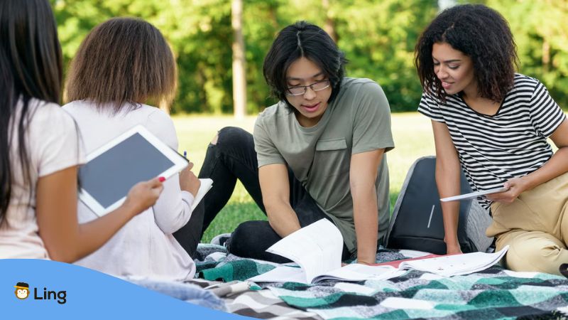 A photo of Cantonese language learners from different nationalities meeting outdoors.