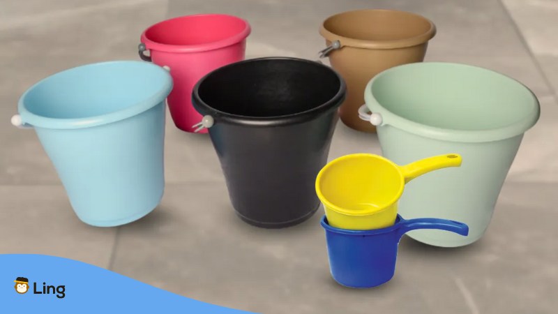A photo of dippers and pails in various colors.