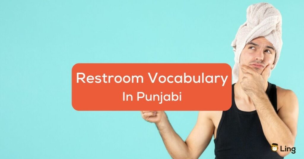 A man in a black sleeveless shirt and a towel on his head beside the restroom vocabulary in Punjabi texts.