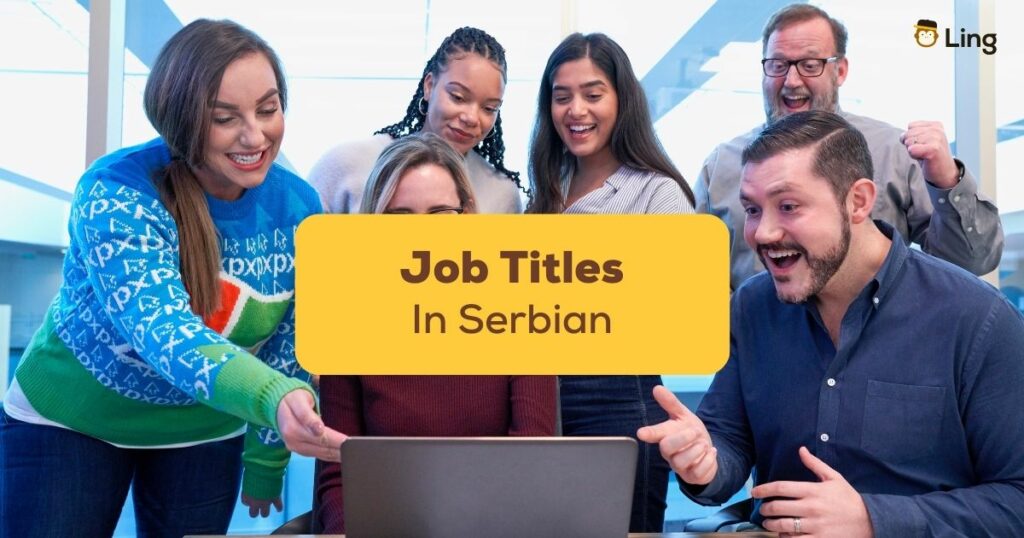 job titles in serbian - co workers together in front of a computer