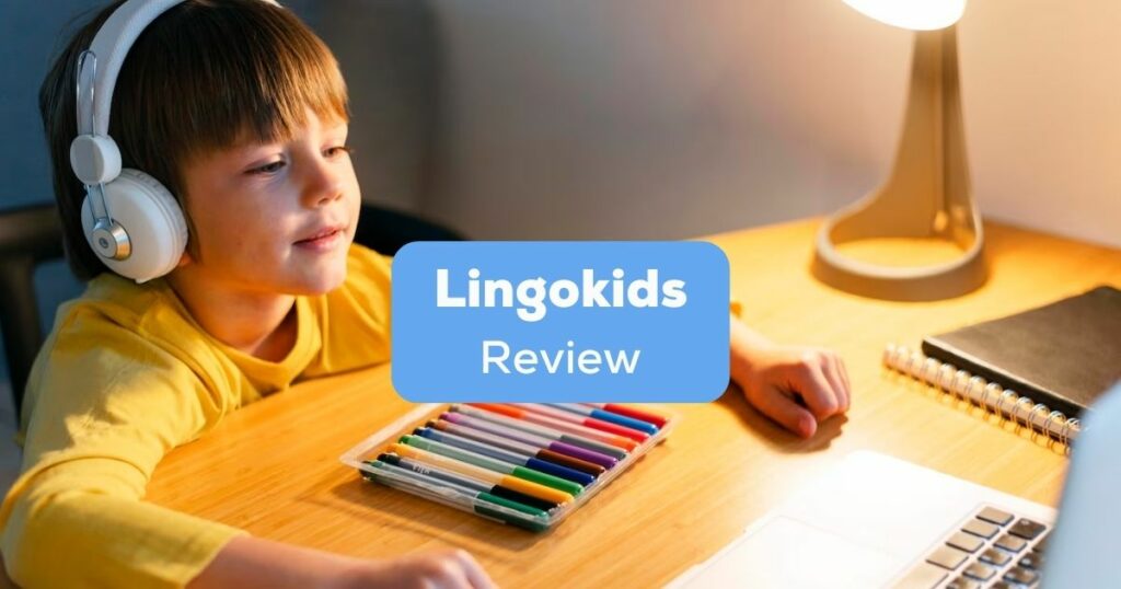 A young boy with his headphones on, learning inside his room in front of a laptop behind the Lingokids review texts.
