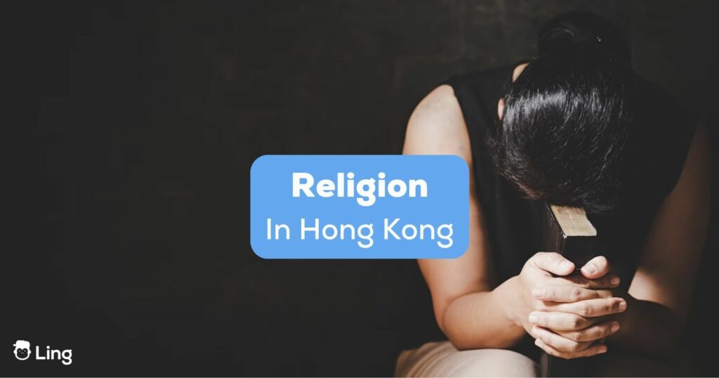 A female holding a Bible in a dark room beside the religion in Hong Kong texts.