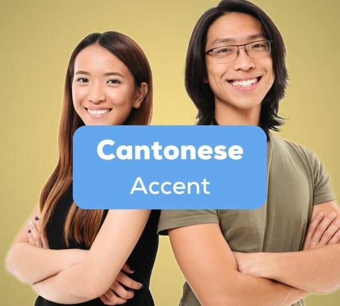 A photo of a smiling male and female with crossed arms behind the Cantonese Accent texts.