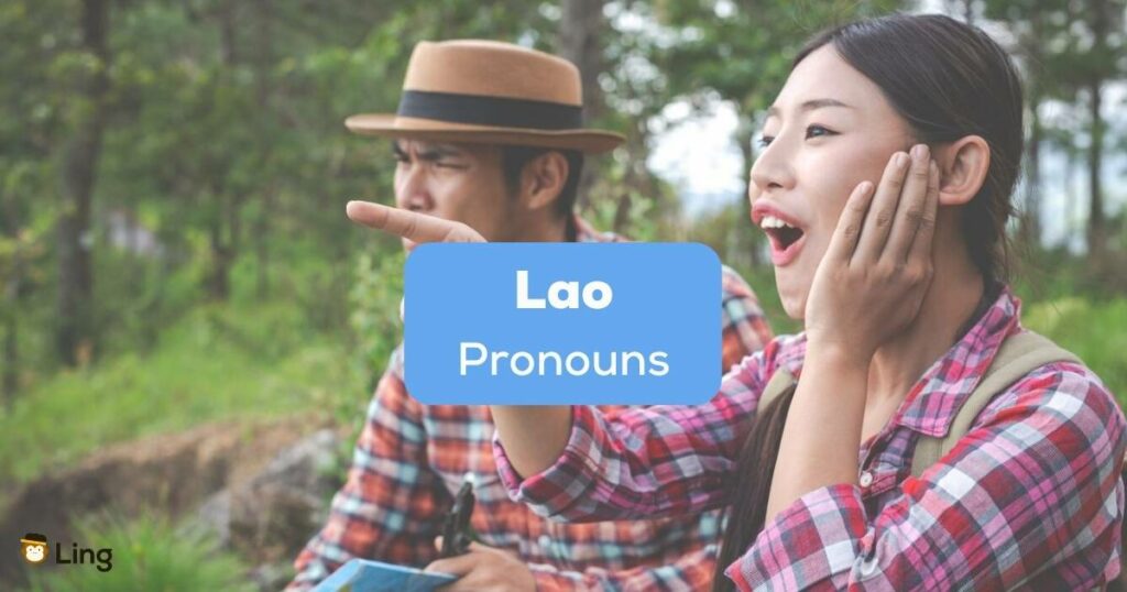 A photo of a girl pointing to someone beside the Lao Pronouns texts.