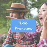 A photo of a girl pointing to someone beside the Lao Pronouns texts.