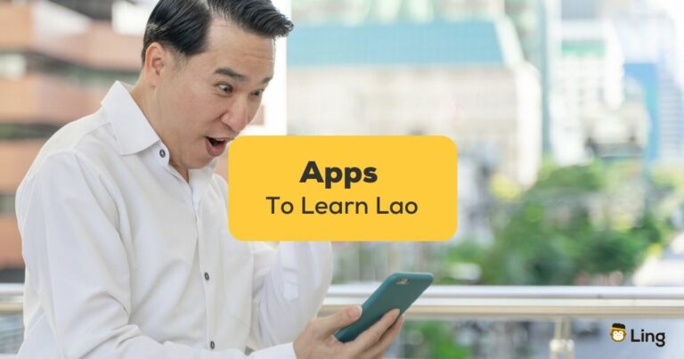 Apps To Learn Lao - A Photo Of A Man Enjoys Using His Mobile Phone Outside