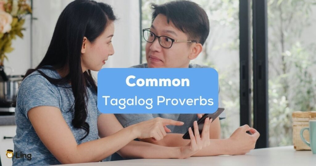 common Tagalog proverbs - A photo of a confused couple using a phone