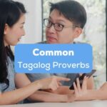 common Tagalog proverbs - A photo of a confused couple using a phone