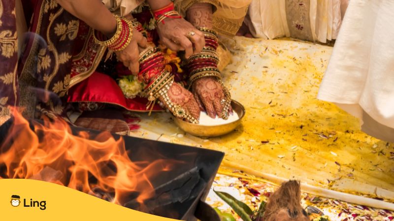 traditional wedding ritual with a hindu bride during a malayali wedding ceremony